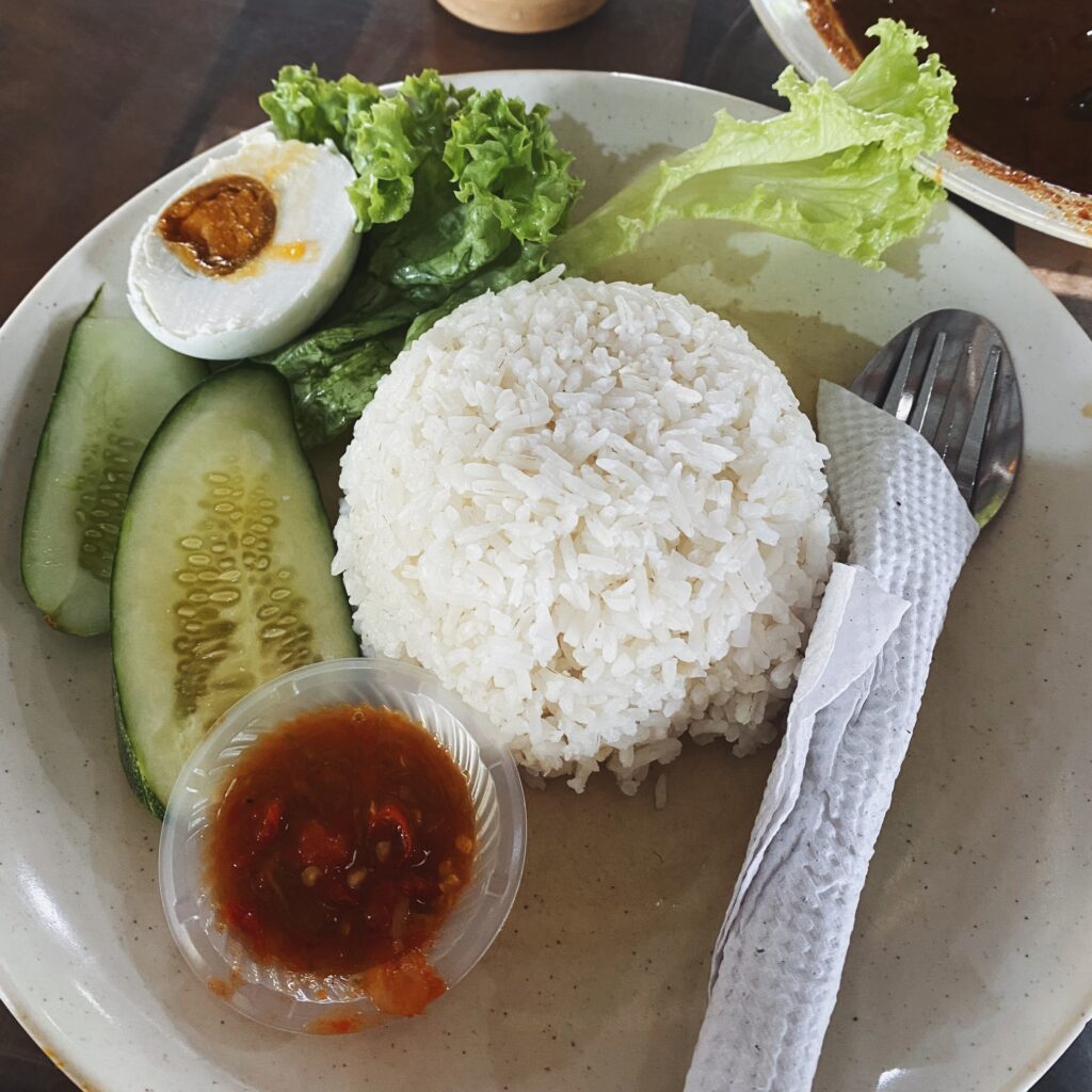 Nasi, telur masin, ulam-ulaman dan sambal belacan